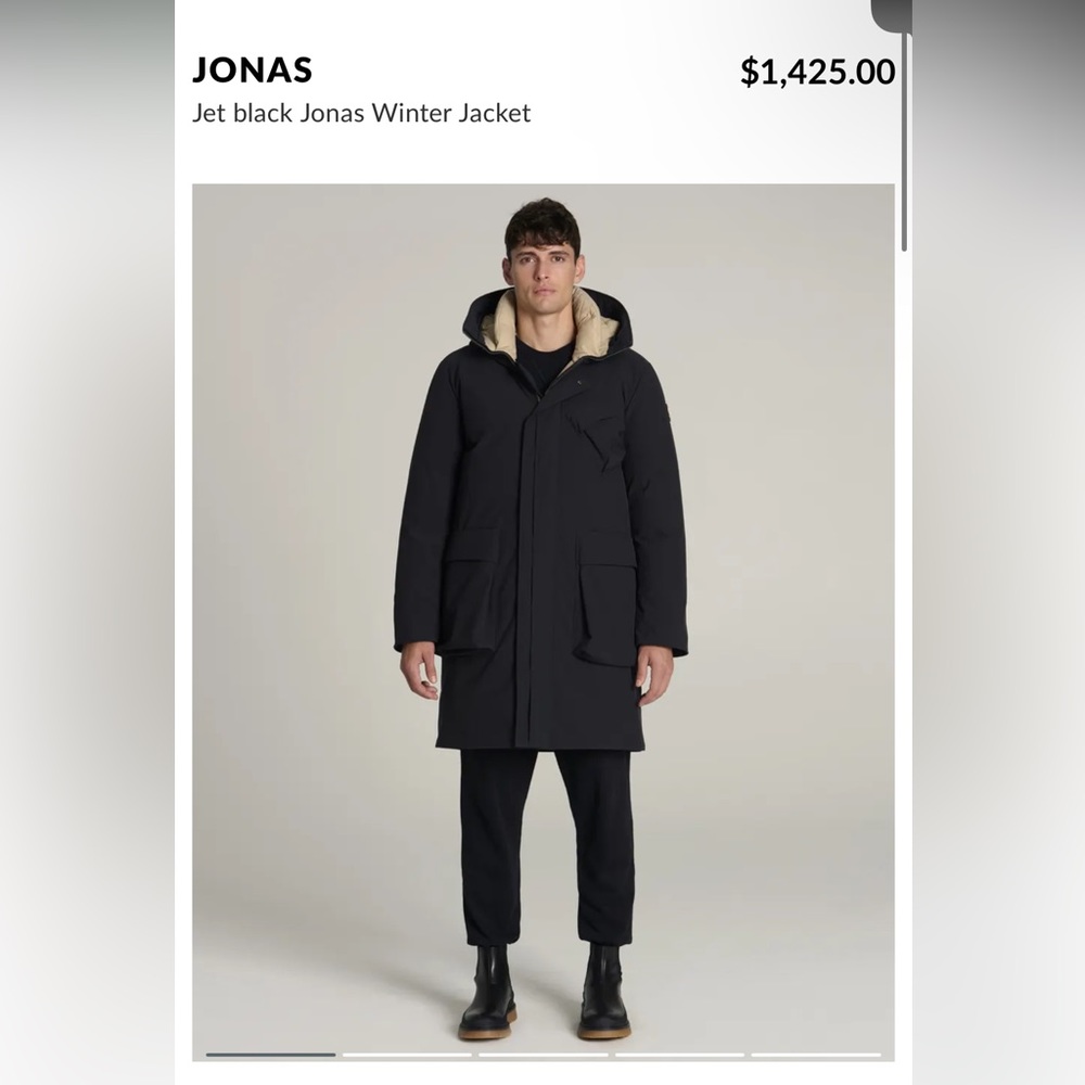 Kanuk jet black Jonas winter coat size medium minor stain